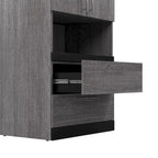 Úzká úložná skříňka se zásuvkami a výsuvnou policí od